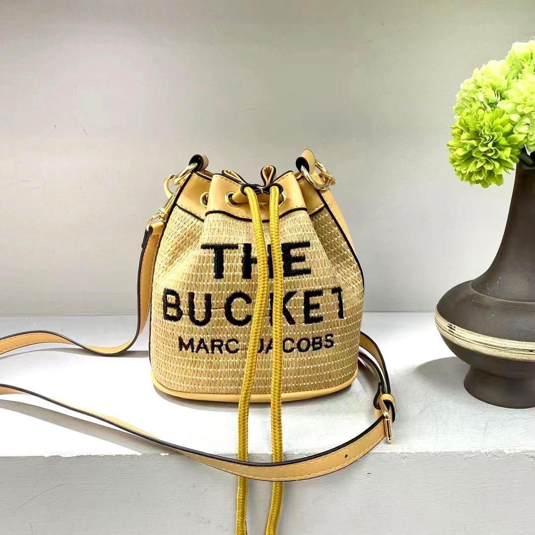THE WOVEN BUCKET BAG WITH BOX